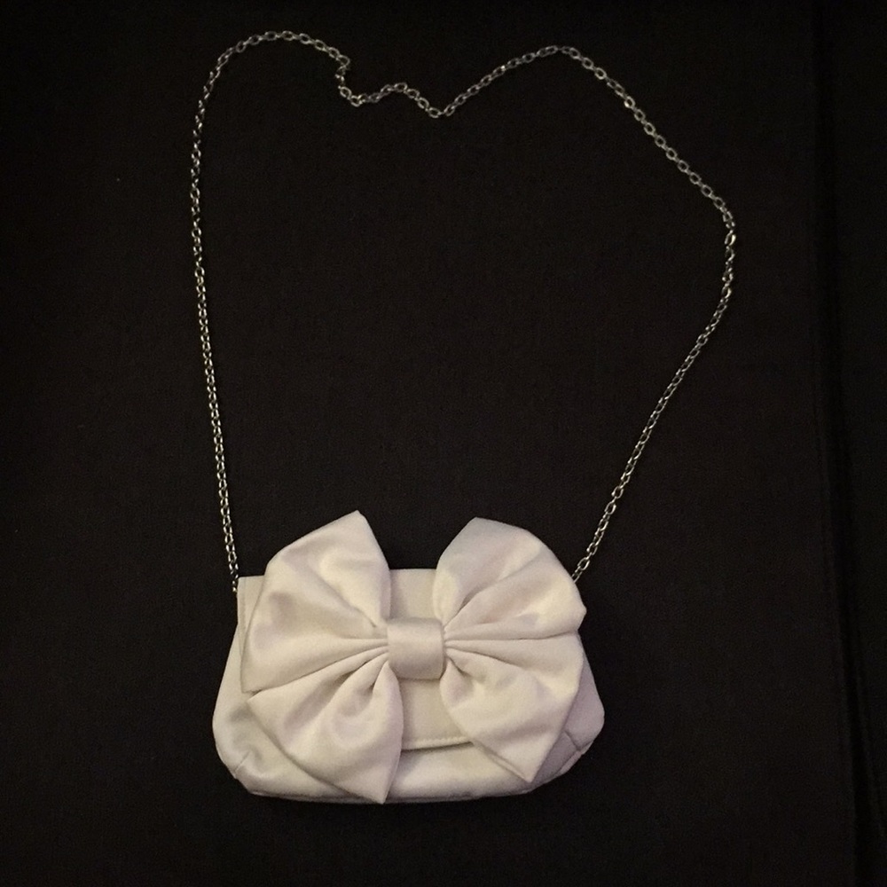 Ivory bow purse